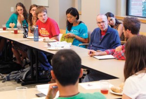 McKibben and students discussing how to change things globally by acting locally.