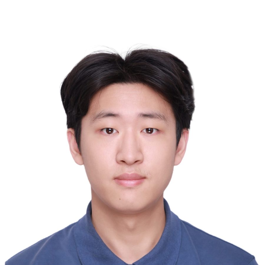 Chinese man with short black hair, in blue shirt