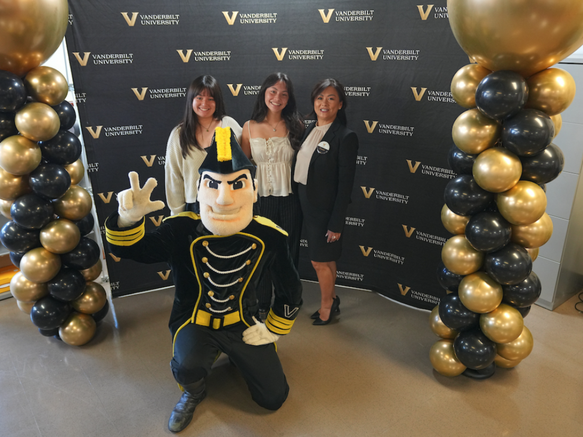 Nashville Vanderbilt Scholars pose with Mr. C