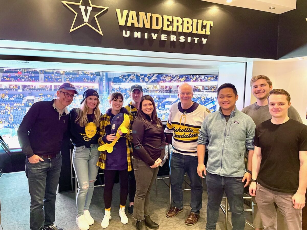 Image of Investments Team at Hockey game 