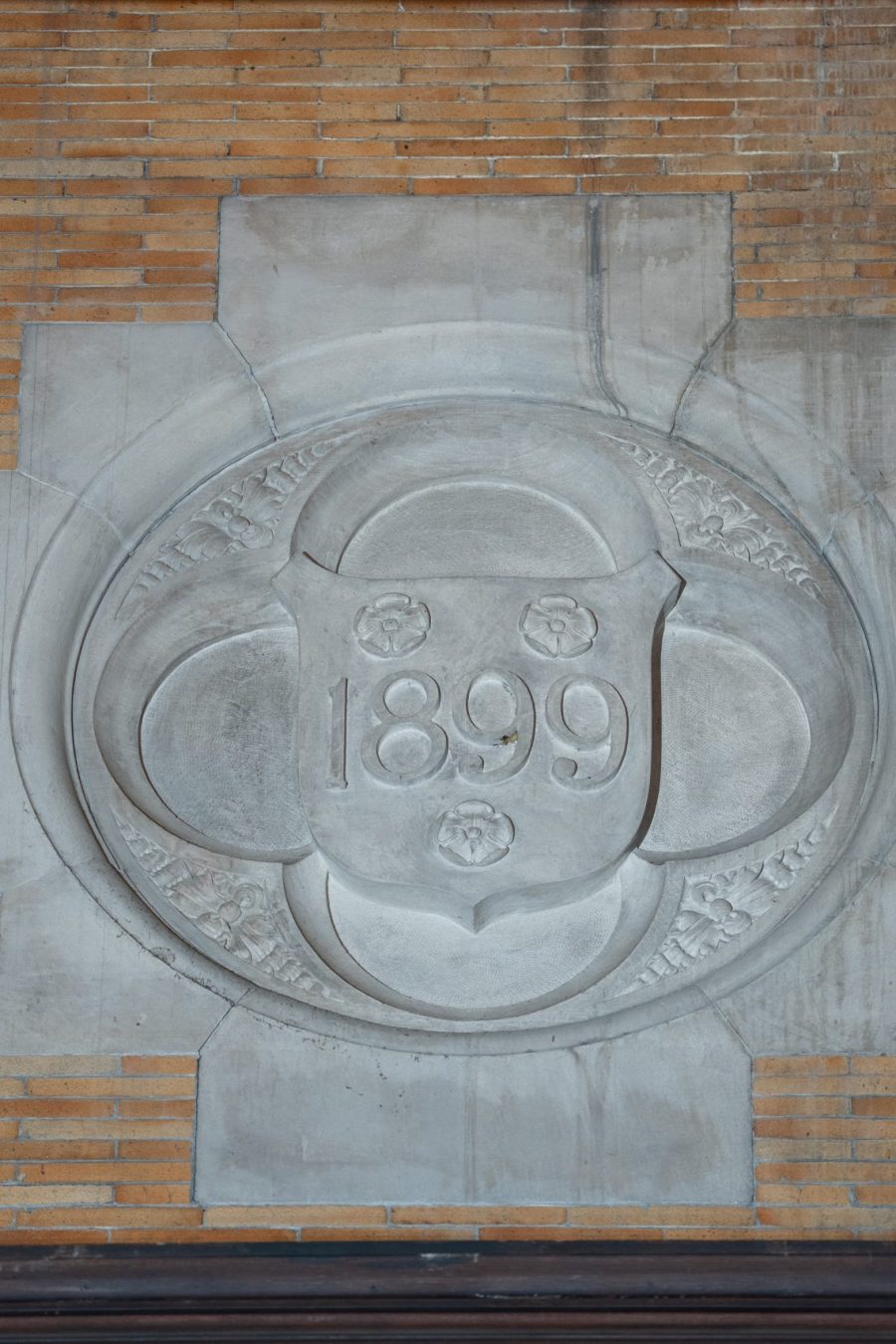 1899 sign at NYC campus