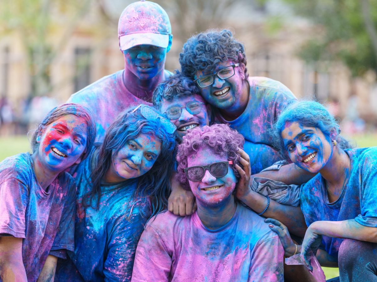 Students participate in Holi 